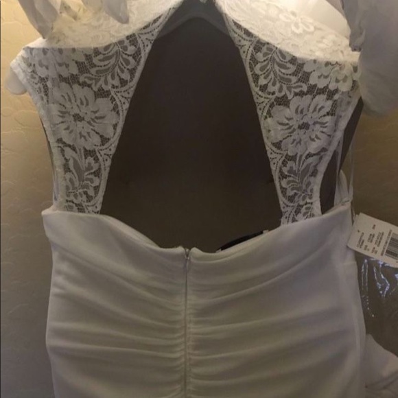David's Bridal Wedding Dress w/Cap Sleeves. Size 12. Brand new. No alterations. - Picture 8 of 10